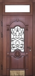 Металлическая уличная термодверь с остекленной фрамугой, ковкой, отбойником и панелями МДФ с резьбой и шпоном