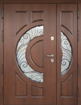 Входная полуторапольная термодверь с фигурными стеклопакетами, коваными решетками и панелями МДФ