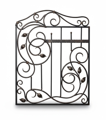 Стальная фигурная решетка на окно кованого типа с листвой