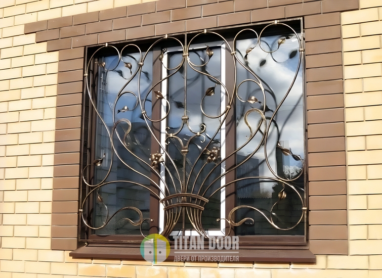 Металлическая решетка для окон из кованых элементов Металлическая решетка для окон из кованых элементов